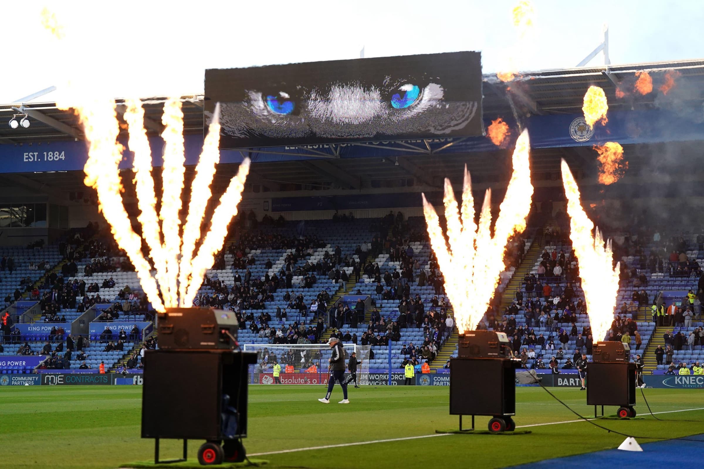 Flames shoot up in front of the stand before kick-off